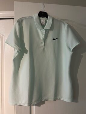 Nike Mint Green Polo Shirt with Black Swoosh